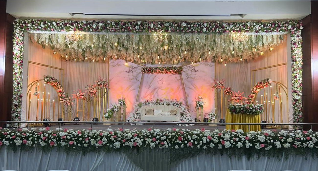 Beautiful engagement stage decoration in Chennai with stylish backdrop and floral decor.